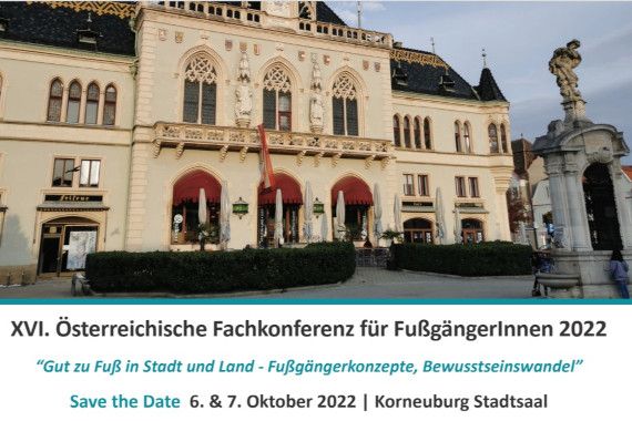 Gelbes großes Gebäude im Hintergrund, Im Vordergrund Beschriftung  XVI. Österreichische Fachkonferenz für Fußgänger:innen 2022